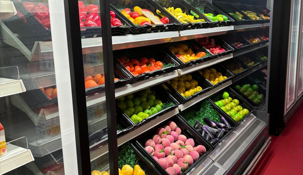 First Select vegetable and fruit open merchandiser with produce baskets