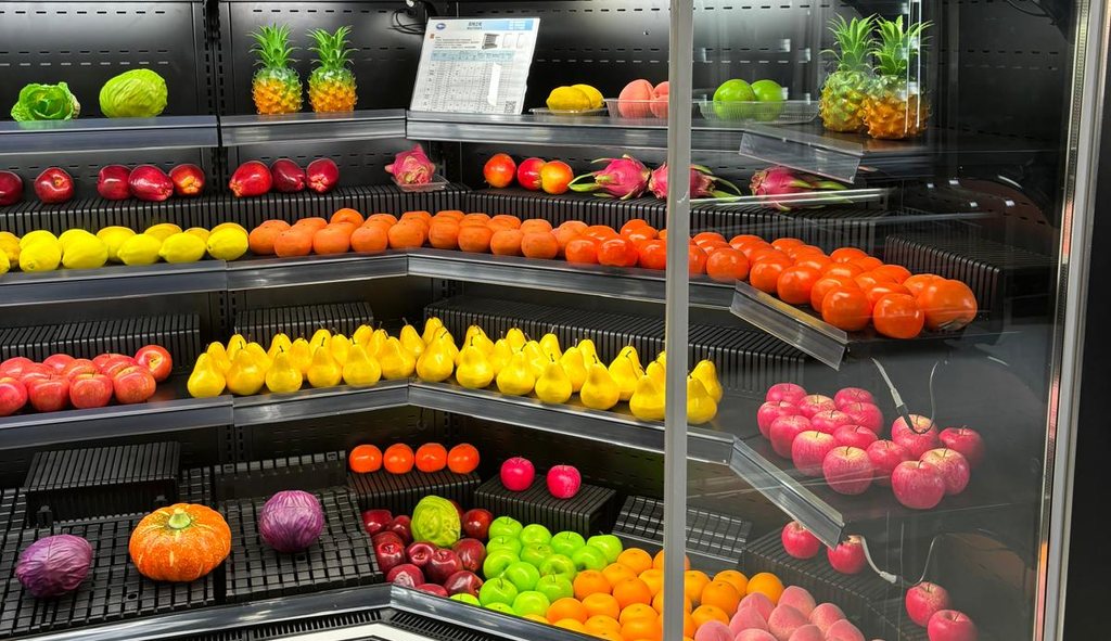 First Select corner open merchandiser displaying fresh fruit and vegetables